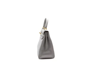 Hermès Kelly 28 Retourne in Bleu Pale Clemence leather with gold hardware – elegant pastel blue luxury handbag - side