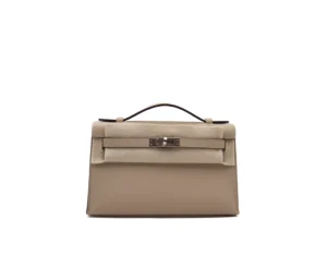 Hermès Kelly Pochette Trench en cuero Swift con herrajes de paladio – bolso de lujo elegante en beige - filz