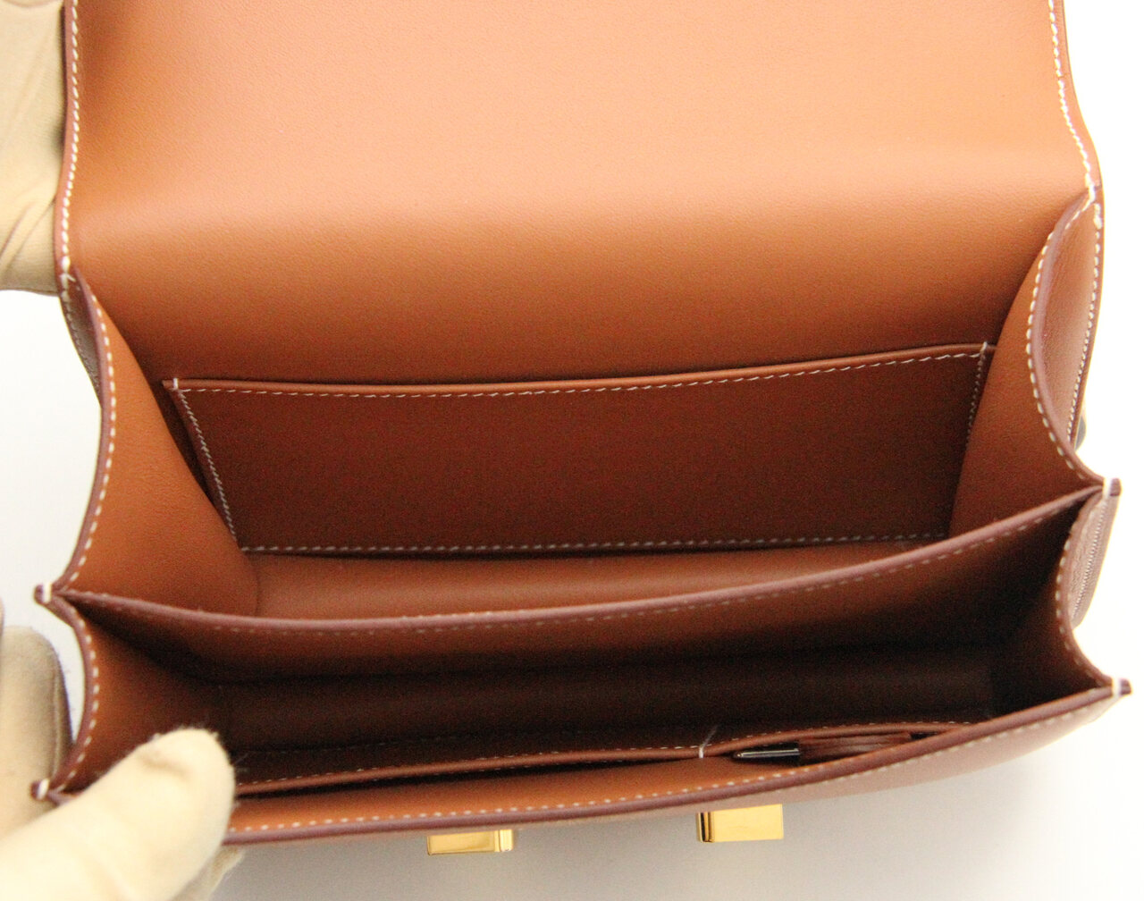 Hermès Constance 18 Gold Swift leather with gold hardware – mini luxury crossbody handbag in camel brown - inside