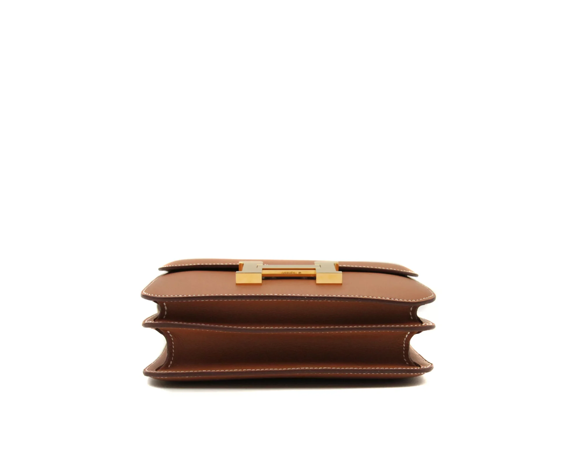 Hermès Constance 18 Gold Swift leather with gold hardware – mini luxury crossbody handbag in camel brown - bottom