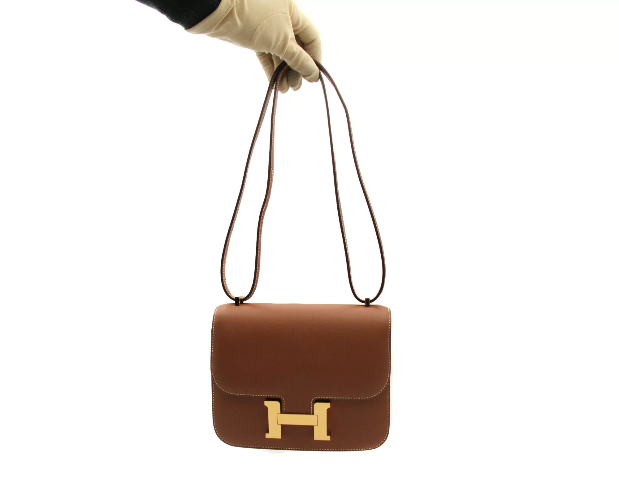 Hermès Constance 18 Gold Swift leather with gold hardware – mini luxury crossbody handbag in camel brown - front